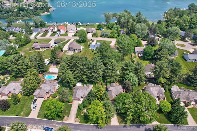 16483 Dawnlight Dr, Fenton, MI 48430 - aerial view of property and surrounding area featuring nearby suburban area and a nearby body of water
