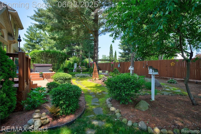 16483 Dawnlight Dr, Fenton, MI 48430 - fenced backyard with a hot tub