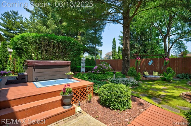 16483 Dawnlight Dr, Fenton, MI 48430 - view of yard with a hot tub and a deck
