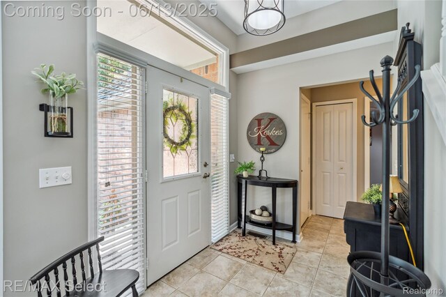 16483 Dawnlight Dr, Fenton, MI 48430 - entrance foyer featuring light tile patterned flooring