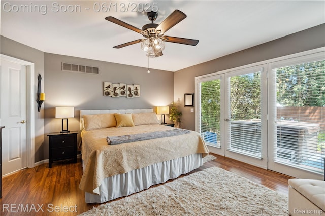 16483 Dawnlight Dr, Fenton, MI 48430 - bedroom with access to exterior, wood finished floors, and a ceiling fan