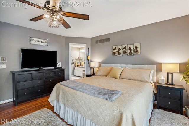 16483 Dawnlight Dr, Fenton, MI 48430 - bedroom featuring wood finished floors, connected bathroom, and ceiling fan
