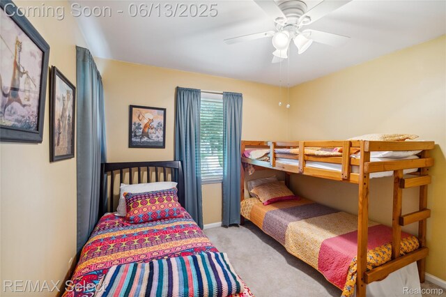 16483 Dawnlight Dr, Fenton, MI 48430 - carpeted bedroom with a ceiling fan and baseboards