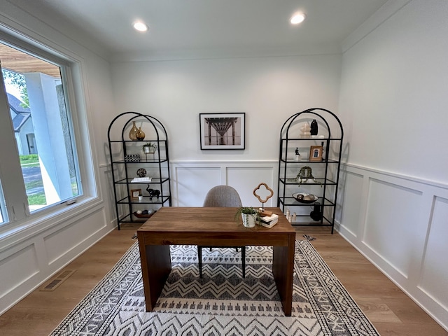 1439 Bennaville Ave, Birmingham, MI 48009 - office featuring light wood-type flooring, a decorative wall, crown molding, wainscoting, and recessed lighting