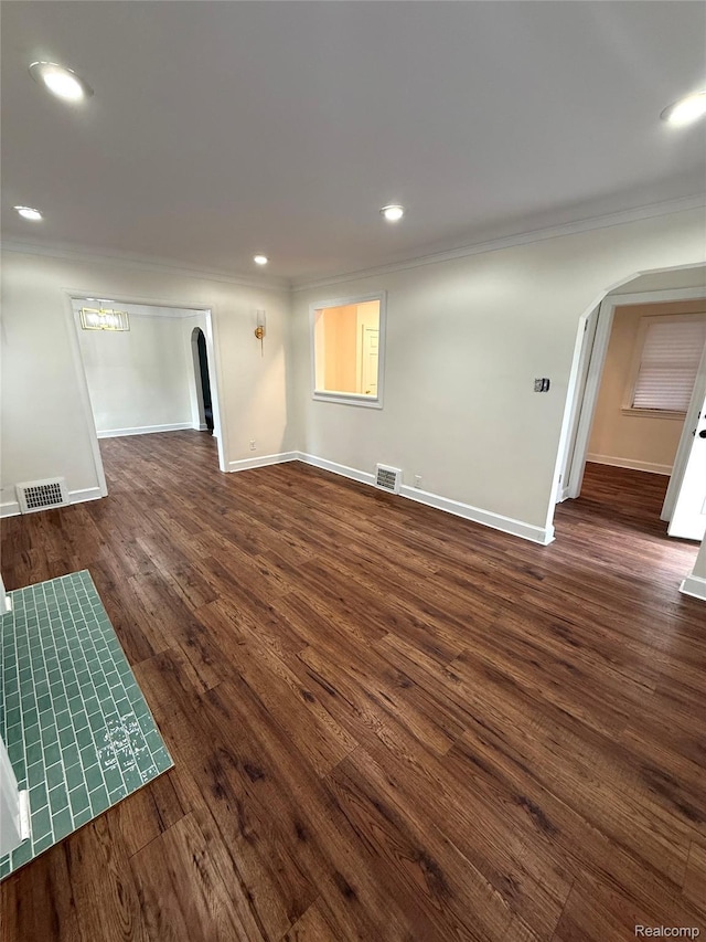 16652 Mendota St, Detroit, MI 48221 - below grade area featuring arched walkways, crown molding, dark wood-style flooring, and recessed lighting