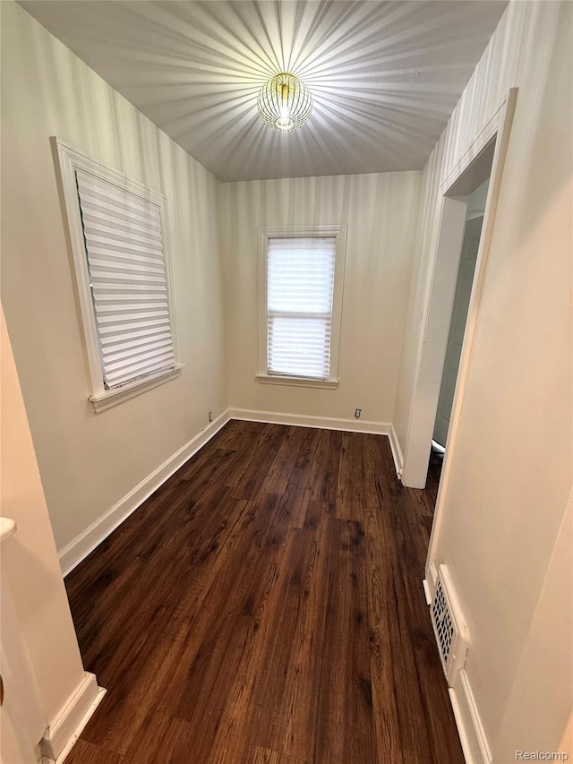 16652 Mendota St, Detroit, MI 48221 - spare room featuring dark wood-style flooring and baseboards