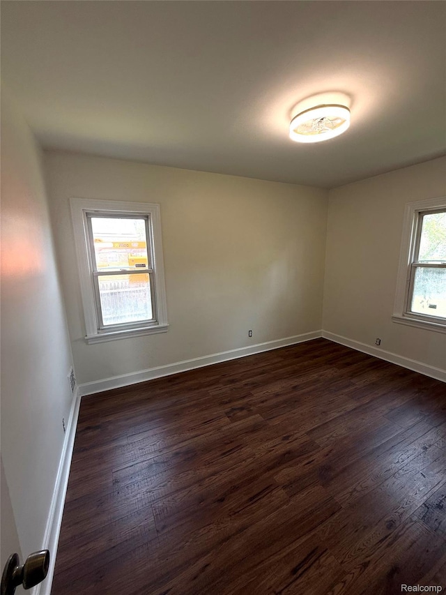 16652 Mendota St, Detroit, MI 48221 - unfurnished room featuring dark wood-style flooring and baseboards