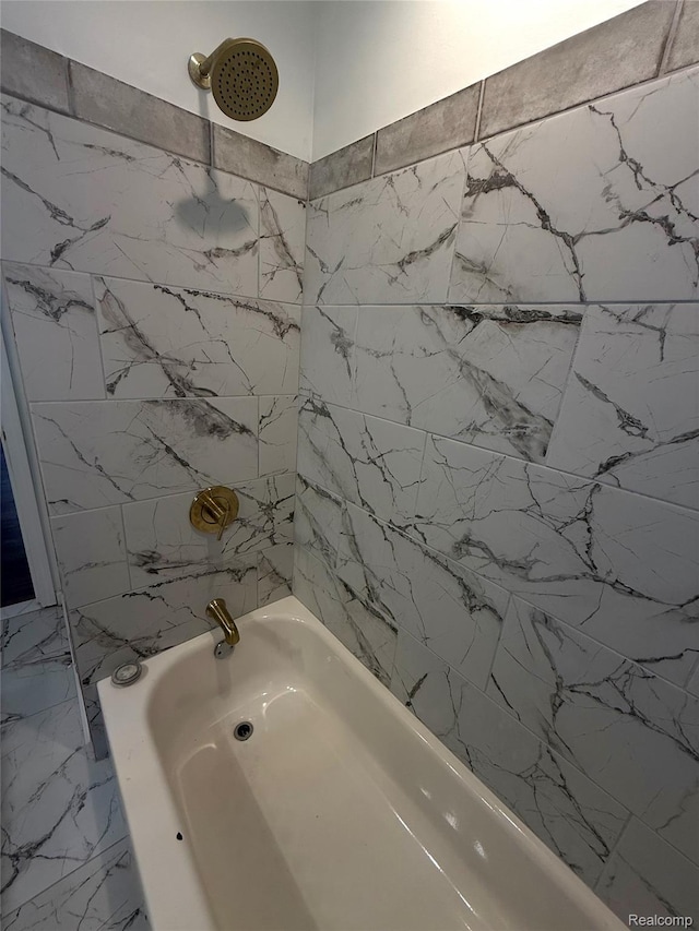 16652 Mendota St, Detroit, MI 48221 - full bath featuring bathing tub / shower combination and marble look tiles