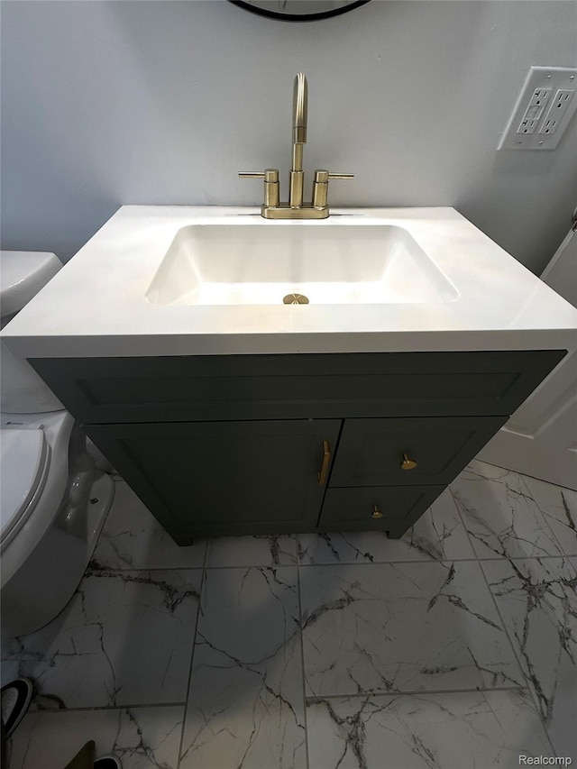 16652 Mendota St, Detroit, MI 48221 - bathroom with vanity and marble finish floors