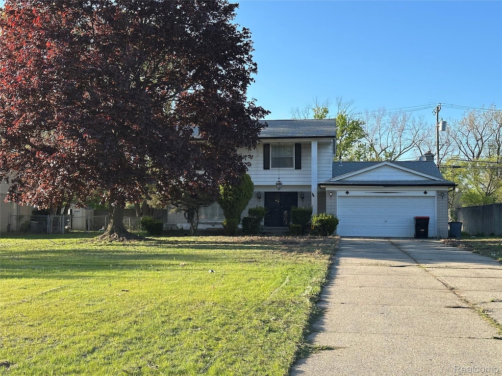 18444 Addison Dr, Detroit, MI 48075 - view of front of house featuring an attached garage and driveway