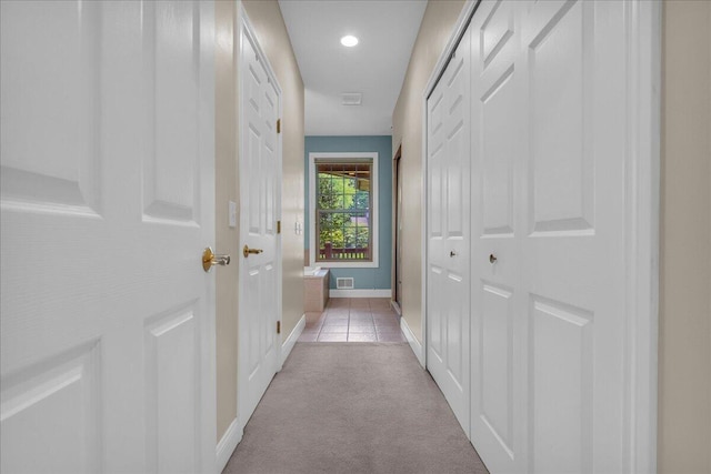 2082 Blackberry Ln, Howell, MI 48855 - hall featuring light colored carpet, baseboards, recessed lighting, and light tile patterned floors