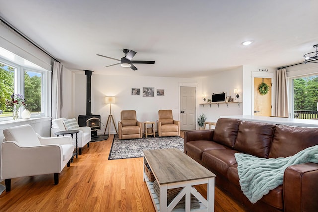 33892 Shirley, Niles, MI 49120 - living room featuring a wood stove, light wood-style floors, ceiling fan, and recessed lighting