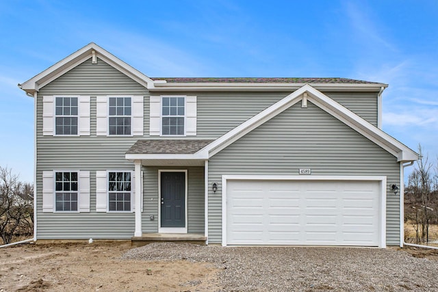 606 Arizona Blvd, Three Rivers, MI 49093 - traditional-style home featuring gravel driveway and roof with shingles