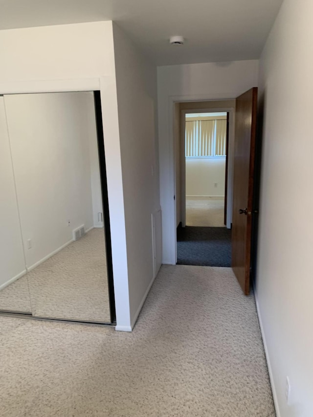 34203 Tomahawk St, Westland, MI 48185 - corridor with baseboards and carpet