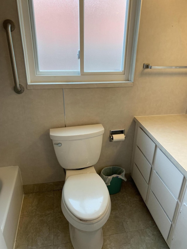 34203 Tomahawk St, Westland, MI 48185 - full bathroom featuring healthy amount of natural light, a tub to relax in, and vanity
