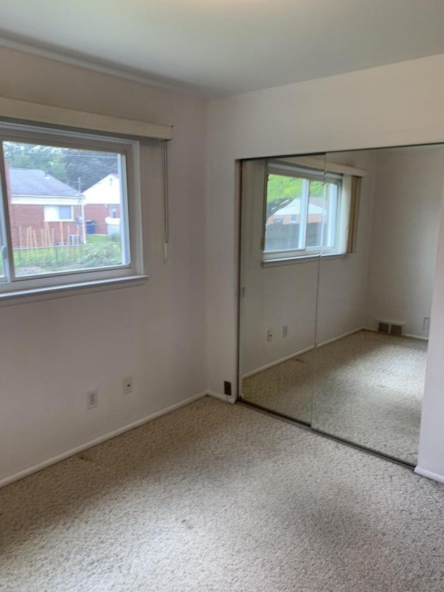 34203 Tomahawk St, Westland, MI 48185 - spare room featuring plenty of natural light and carpet floors