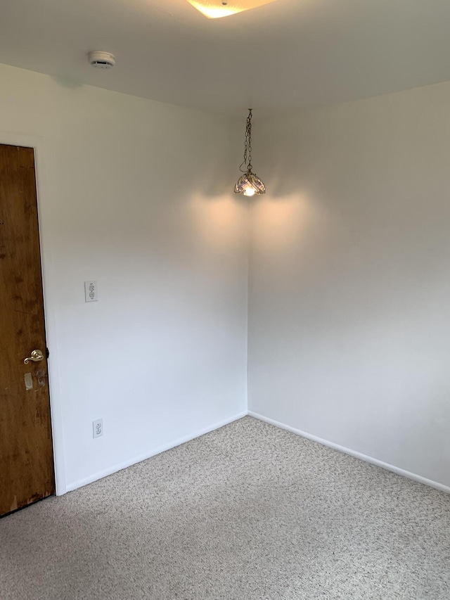 34203 Tomahawk St, Westland, MI 48185 - carpeted spare room with a smoke detector and baseboards