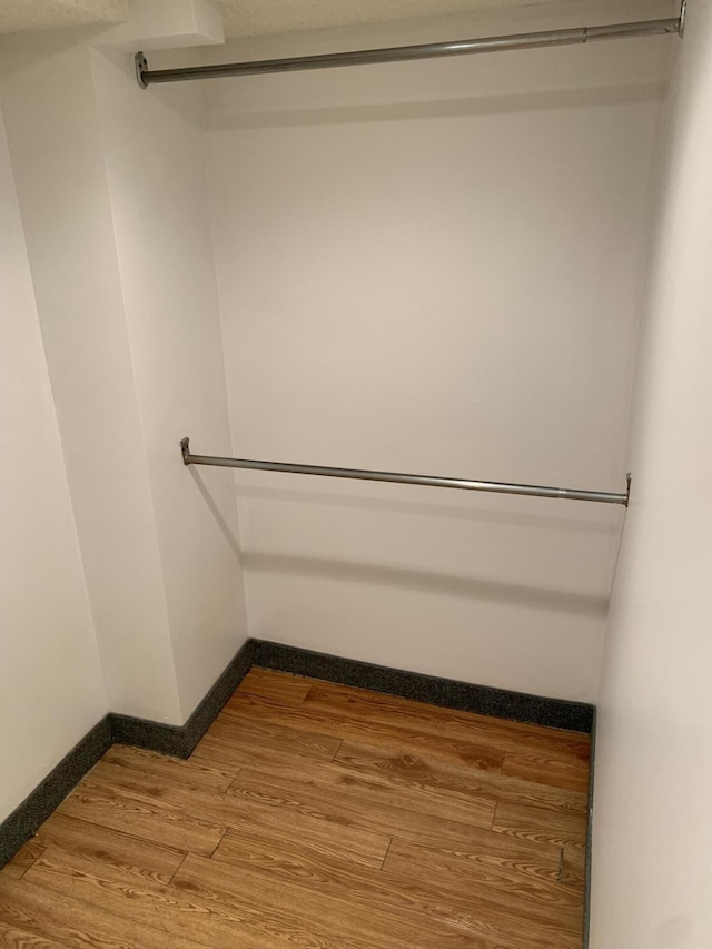 34203 Tomahawk St, Westland, MI 48185 - spacious closet featuring wood finished floors