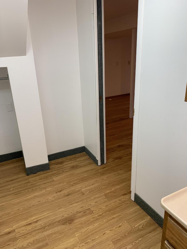 34203 Tomahawk St, Westland, MI 48185 - unfurnished bedroom featuring baseboards and light wood-style flooring
