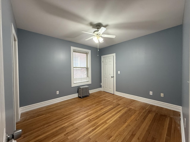 469 W Willis St Unit 4, Detroit, MI 48201 - empty room featuring ceiling fan, baseboards, and wood finished floors