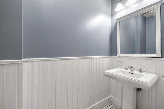 469 W Willis St Unit 4, Detroit, MI 48201 - bathroom with wainscoting and a sink