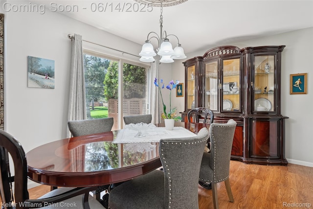 46860 High Meadows Ct, Macomb, MI 48044 - dining area featuring a chandelier and light wood finished floors