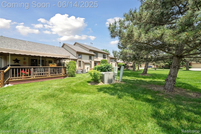 46860 High Meadows Ct, Macomb, MI 48044 - view of green lawn with a wooden deck
