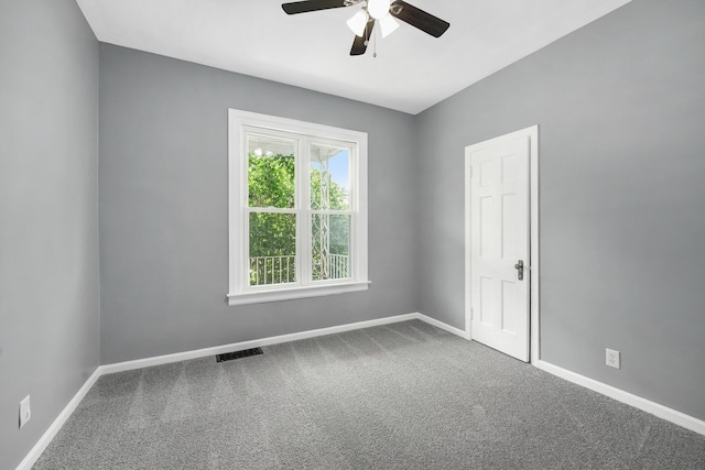 1169 3rd St NW, Grand Rapids, MI 49504 - unfurnished room with a ceiling fan, carpet, and baseboards