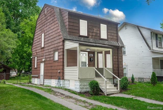 17376 Fielding St, Detroit, MI 48219 - view of front of home with a gambrel roof and roof with shingles