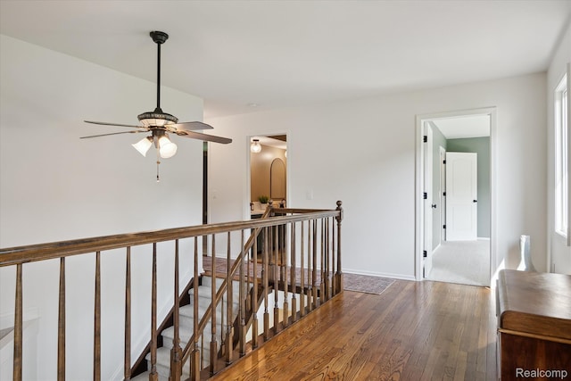 5695 Deerwood, Commerce Twp, MI 48382 - hall with an upstairs landing and hardwood / wood-style flooring