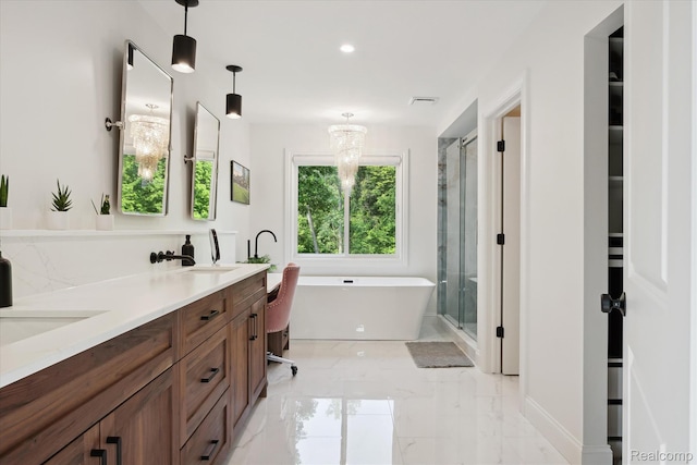5695 Deerwood, Commerce Twp, MI 48382 - bathroom featuring a soaking tub, double vanity, a shower stall, marble finish flooring, and recessed lighting