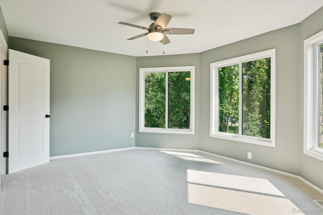 5695 Deerwood, Commerce Twp, MI 48382 - carpeted spare room with healthy amount of natural light and a ceiling fan