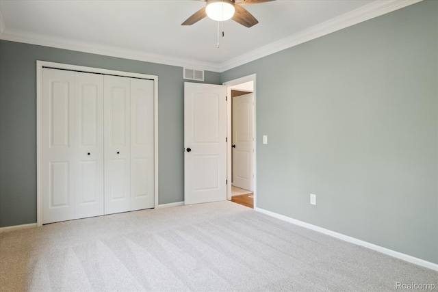 5695 Deerwood, Commerce Twp, MI 48382 - unfurnished bedroom featuring ornamental molding, carpet, a closet, and ceiling fan