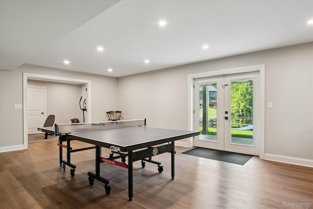 5695 Deerwood, Commerce Twp, MI 48382 - rec room featuring french doors, wood finished floors, and recessed lighting