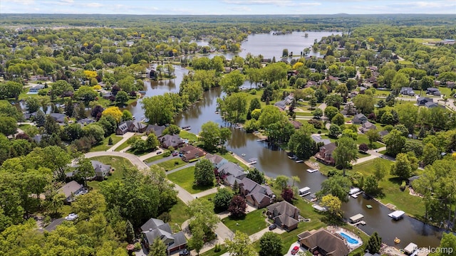 5695 Deerwood, Commerce Twp, MI 48382 - aerial perspective of suburban area with a large body of water