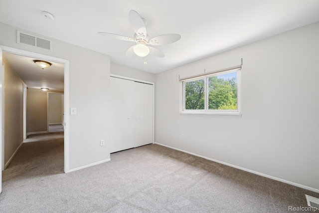 7302 Parkway Ct, Canton, MI 48187 - unfurnished bedroom featuring carpet flooring, a closet, and ceiling fan