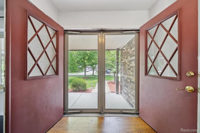 7302 Parkway Ct, Canton, MI 48187 - doorway to outside featuring wood finished floors