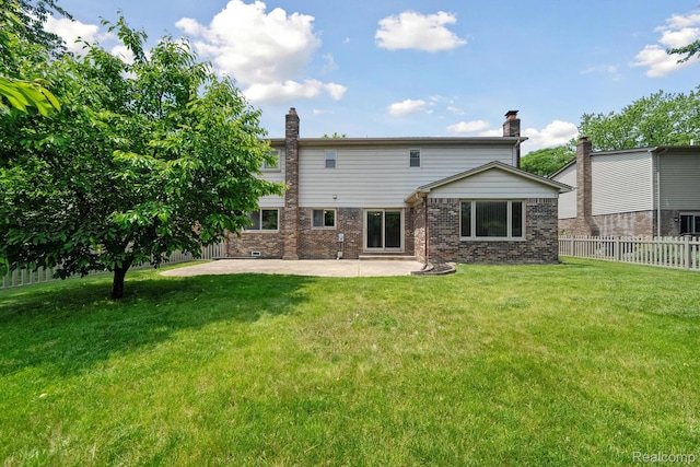 7302 Parkway Ct, Canton, MI 48187 - rear view of house with a patio, brick siding, and a chimney