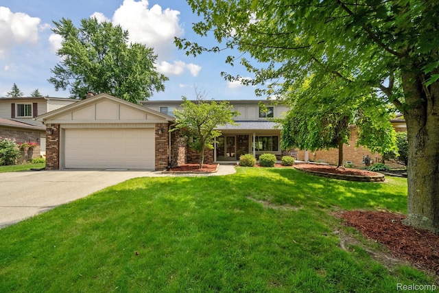 7302 Parkway Ct, Canton, MI 48187 - view of front of home with an attached garage, a front lawn, brick siding, and concrete driveway