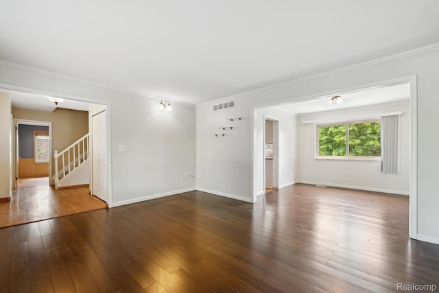 7302 Parkway Ct, Canton, MI 48187 - unfurnished living room featuring hardwood / wood-style floors, stairs, and crown molding