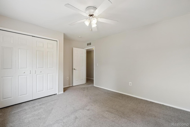 7302 Parkway Ct, Canton, MI 48187 - unfurnished bedroom with carpet flooring, a closet, and ceiling fan