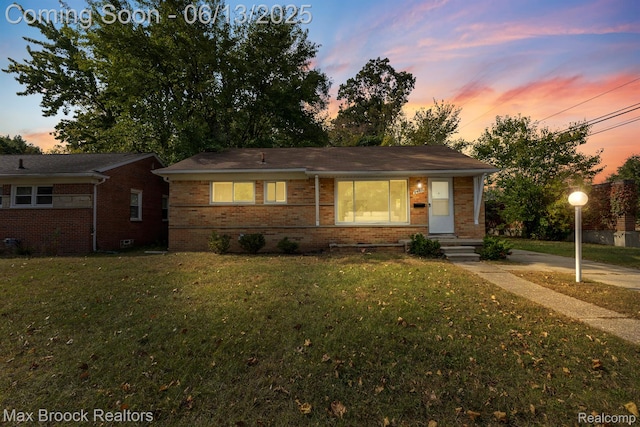 24811 Sherman St, Oak Park, MI 48237 - view of front facade with brick siding and a front yard