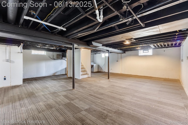 24811 Sherman St, Oak Park, MI 48237 - below grade area featuring stairway, washer / clothes dryer, carpet floors, and plenty of natural light