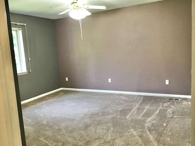 1077 Wedgewood Dr, Plainwell, MI 49080 - unfurnished room featuring ceiling fan, carpet flooring, and baseboards