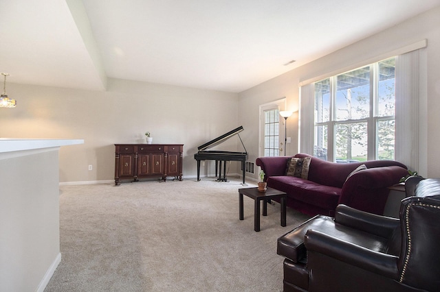1468 Fox Pointe Cir, Ann Arbor, MI 48108 - living room featuring baseboards and light carpet
