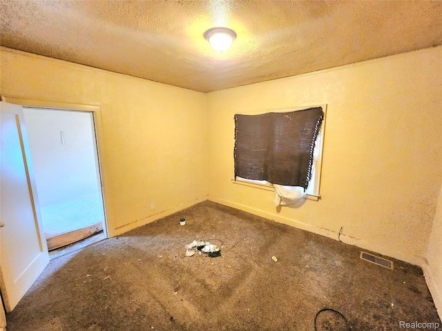 16612 Ilene St, Detroit, MI 48221 - spare room featuring a textured ceiling and carpet