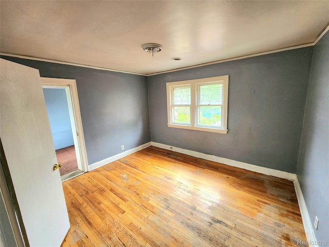 16612 Ilene St, Detroit, MI 48221 - unfurnished room featuring light wood-style floors and ornamental molding
