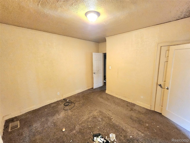 16612 Ilene St, Detroit, MI 48221 - unfurnished room featuring a textured ceiling and baseboards