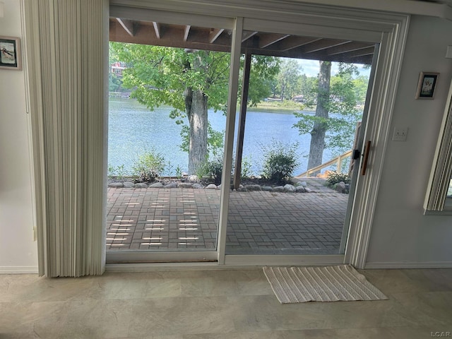 112 Kilkenny Dr, Onsted, MI 49265 - doorway to outside featuring a water view and baseboards
