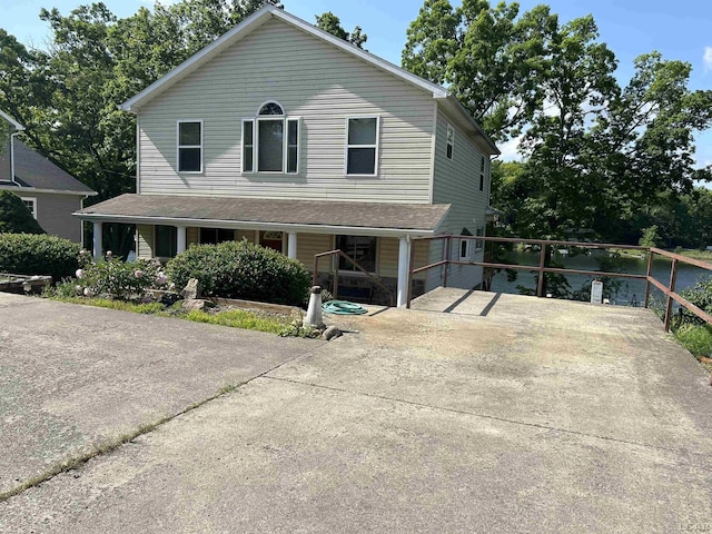 112 Kilkenny Dr, Onsted, MI 49265 - country-style home with covered porch and concrete driveway